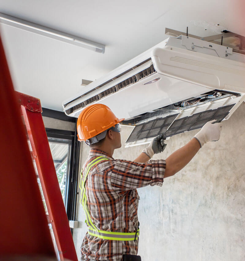 Air Conditioning Technician And A Part Of Preparing To Install N