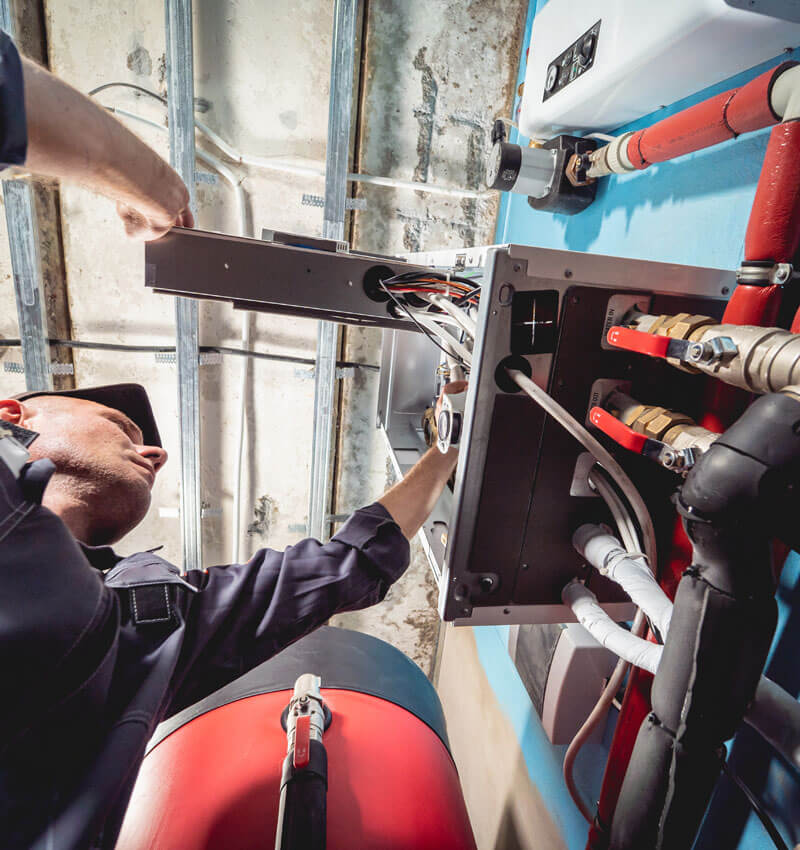 Air Conditioning Technician Is Checking Air Conditioner