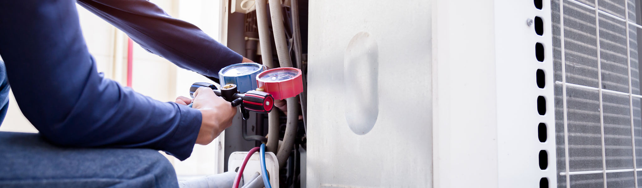 Technician Is Checking Air Conditioner ,measuring Equipment For